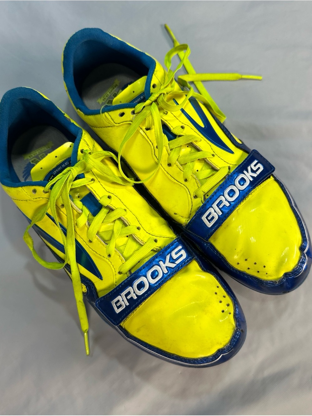 Brooks Neon Yellow with Blue Accent Sprint Spikes